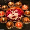 Flower shape urli bowl with floating diya